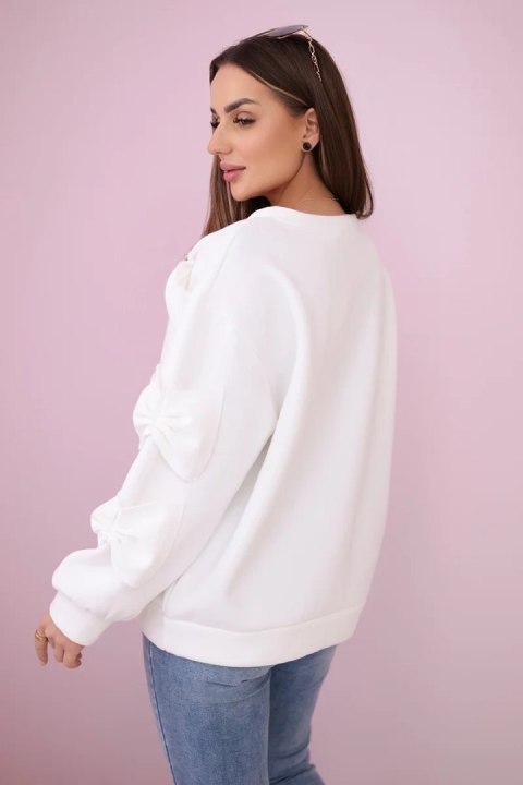 Bluza ocieplana z ozdobnymi kokardami ecru Bluza ocieplana z ozdobnymi kokardami ecru