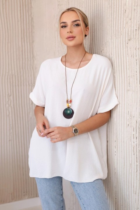 Bluzka oversize z wisiorkiem jasno beżowa Bluzka oversize z wisiorkiem jasno beżowa