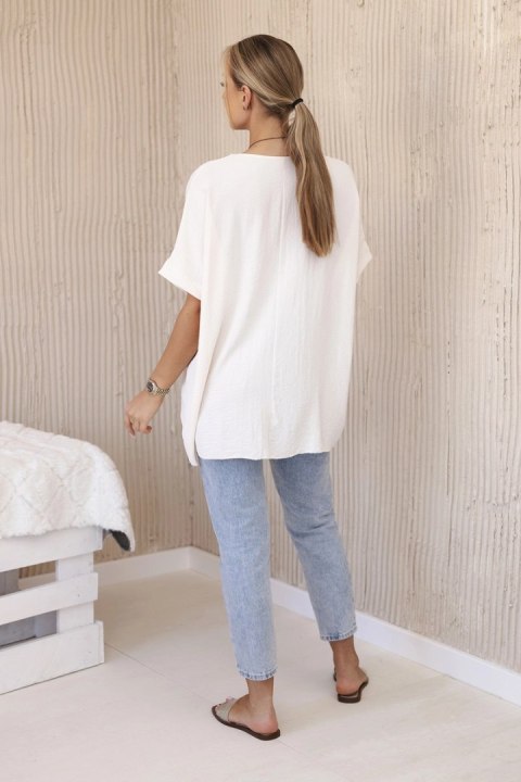 Bluzka oversize z wisiorkiem jasno beżowa Bluzka oversize z wisiorkiem jasno beżowa