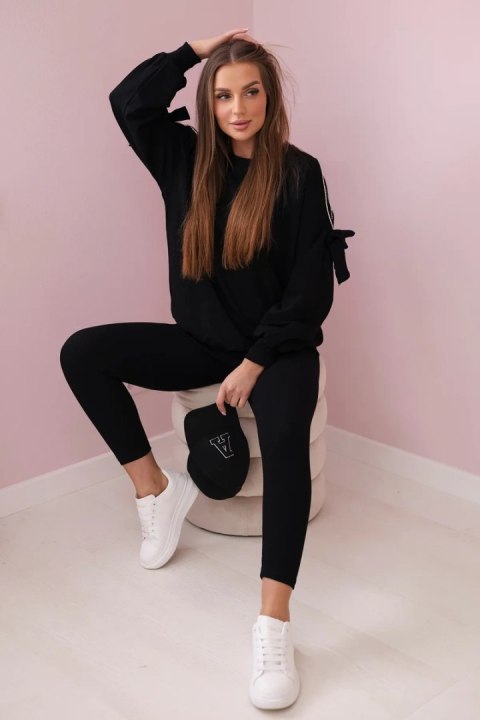 Komplet bluzy z kokardą na rękawach i legginsów czarny Komplet bluzy z kokardą na rękawach i legginsów czarny
