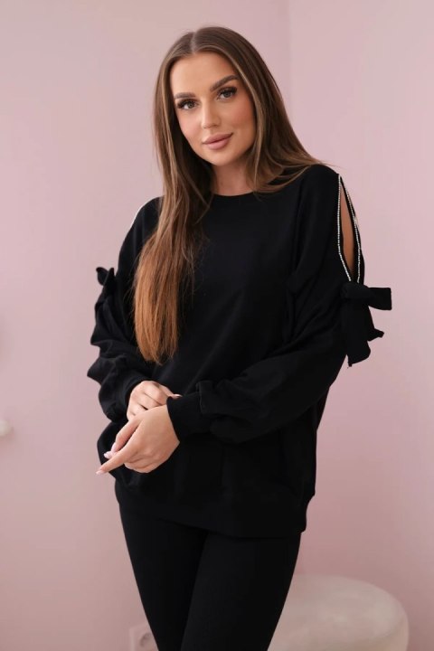 Komplet bluzy z kokardą na rękawach i legginsów czarny Komplet bluzy z kokardą na rękawach i legginsów czarny