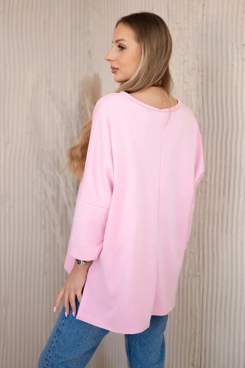 Bluzka oversize z wisiorkiem Masełko jasno różowa Bluzka oversize z wisiorkiem Masełko jasno różowa