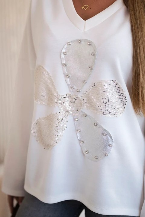 Bluza masełko z ozdobnym kwiatem ecru Bluza masełko z ozdobnym kwiatem ecru
