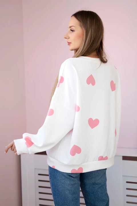 Bluza masełko z nadrukiem serc pudrowy róż Bluza masełko z nadrukiem serc pudrowy róż
