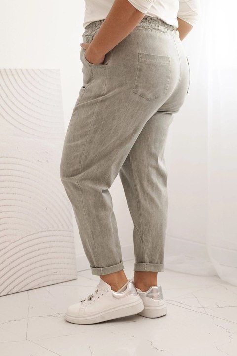 Spodnie damskie dekatyzowane Plus Size z gumką i kieszeniami beżowe