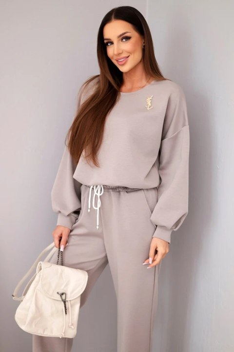 Komplet damski masełko bluza z broszką i spodnie z prostą nogawką fango