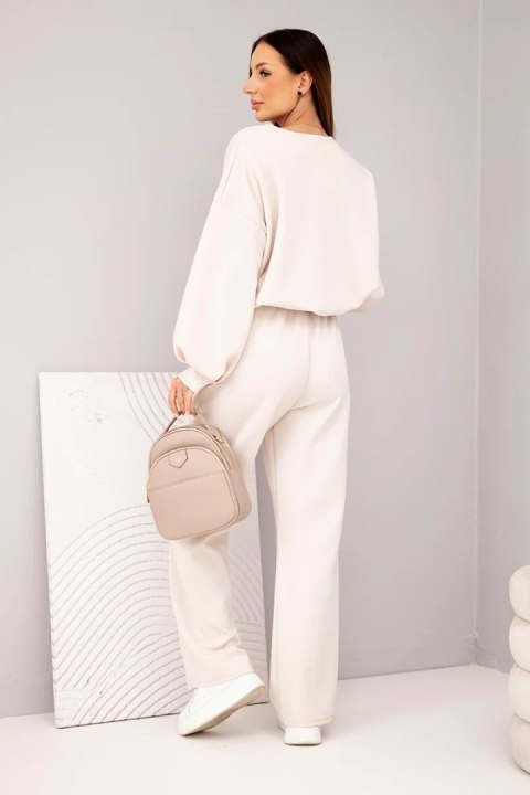 Komplet damski masełko bluza z broszką i spodnie z prostą nogawką beżowy