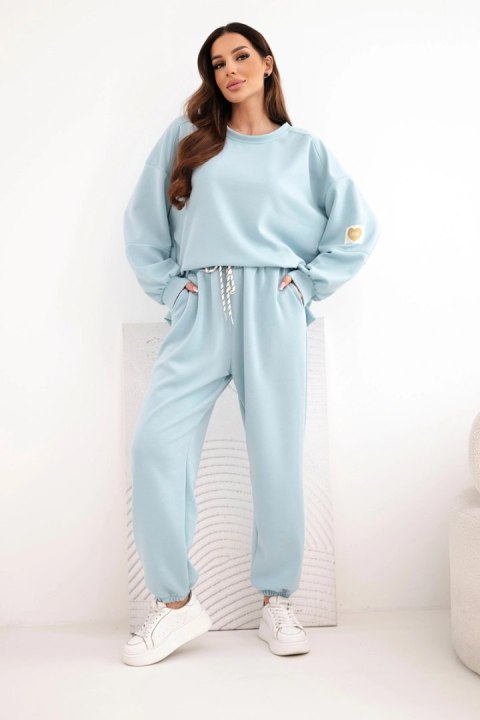 Komplet damski masełkowy z luźną bluzą i spodniami z napisem LOVE ciemno miętowy