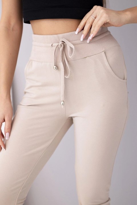 Spodnie damskie dresowe bawełniane z wysokim stanem i wiązaniem beżowe
