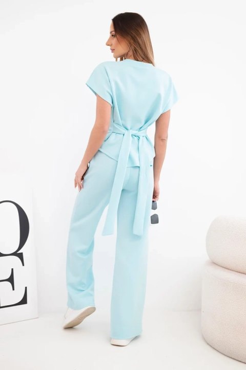 Komplet damski masełko z bluzką z krótkim rękawem i spodniami szeroka nogawka miętowy