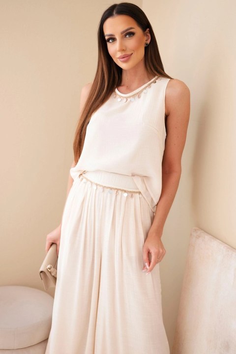 Komplet damski z wiskozą z topem bez rękawów i spodniami szeroka nogawka z ozdobnym wykończeniem beżowy